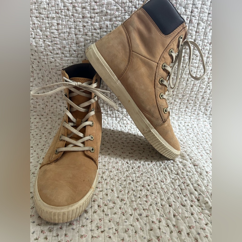 Women’s tan Timberland boots.